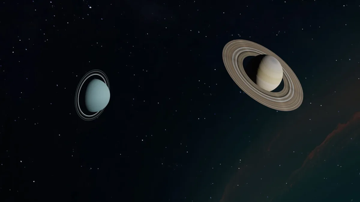 Image of Saturn and Uranus with their rings against a starry backdrop in space.